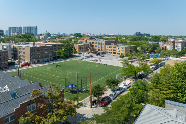 Aerial view of playing fields and back of Alcott College Prep East Campus, Chicago Illinois.