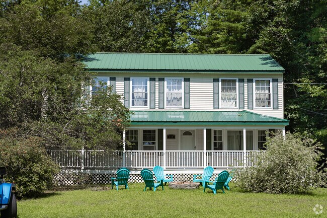 This Colonial home found in Standish has a large porch.