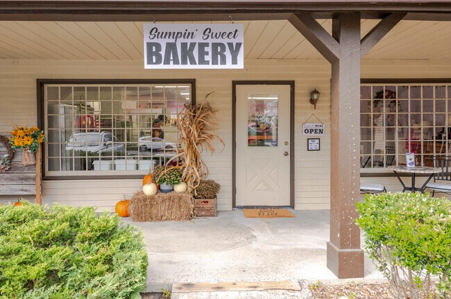 The simple sign above the door of Sumpin' Sweet Bakery is dwarfed by the amazing aroma.