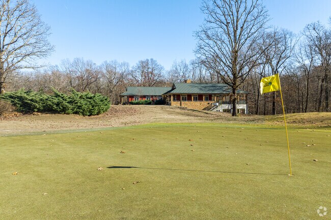 Residents practice putting at the Frank G. Clement Golf Course near White Bluff.