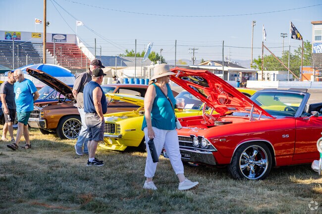 Residents of southeast Meridian peruse the colorful auto entries at the 2024 CruzNCar show.