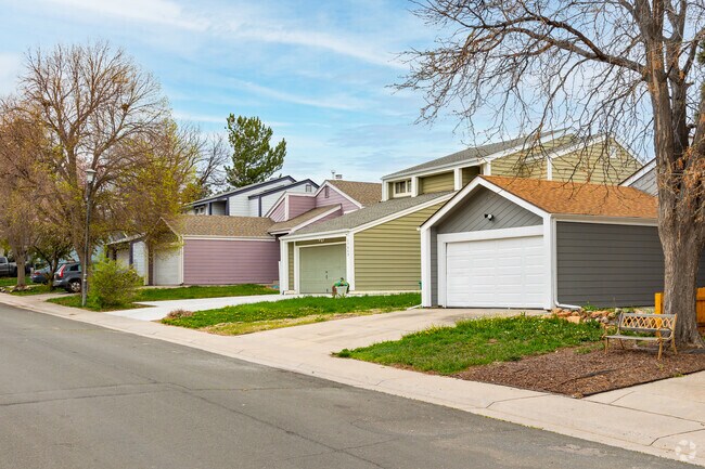 An eclectic mix of houses from the 80s with attached garages can be found in Tollgate Overlook.