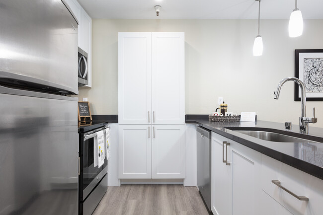 Modern Collection Kitchen With New Cabinetry And Hard Surface Flooring