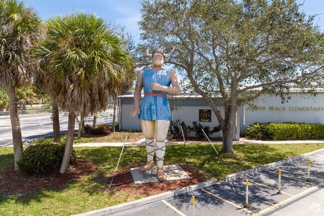 Jensen Beach Elementary Front entrance with school spirit mascot statue.