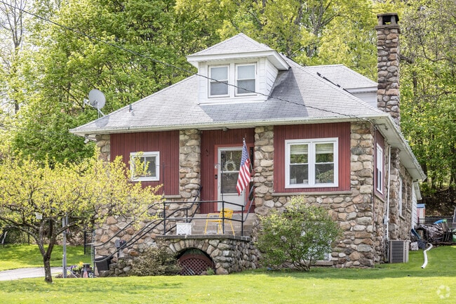 A stone colonial style house in Monroe, NY.
