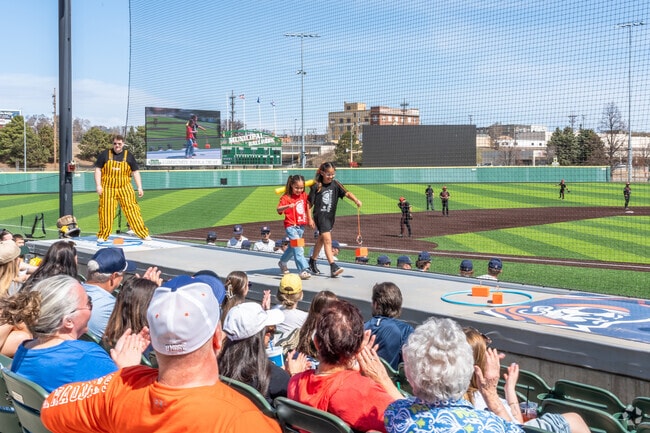 Kids compete for prizes during the Bismarck Youth Baseball Day near Park Hill.