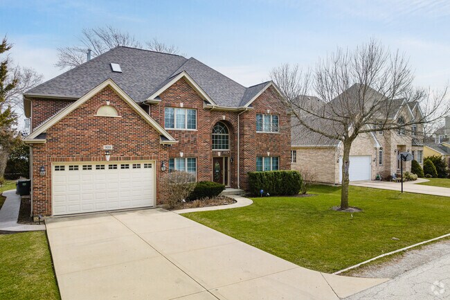 Large suburban brick homes are a common sight in The Willows