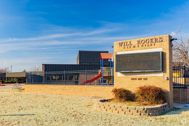 Close up shot of the signage of Will Rogers Elementary School.