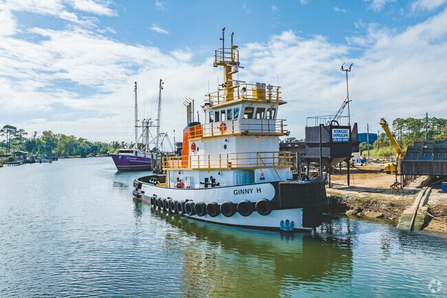 Coden has many tugs and shrimp boats along the bayous.