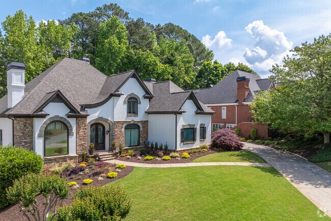 Stunning estates with unique architecture and lush landscaping are found throughout Nesbit Lakes.