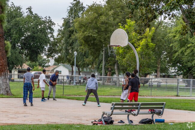 Locals play basketball at Wilson Park near Benton Park.