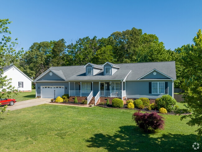 Single story homes sitting on large plots of land can be found all around Inman, SC.