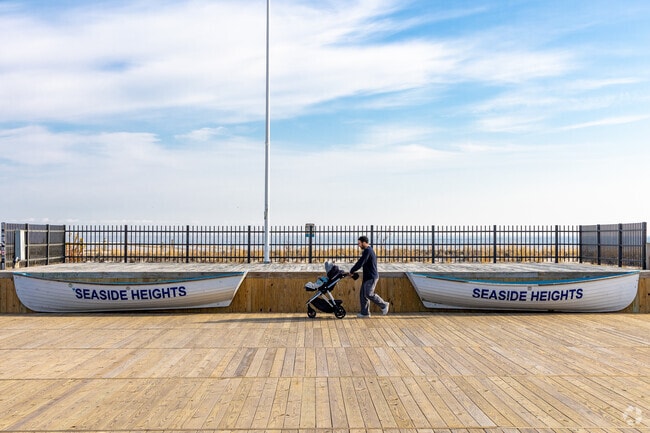 Seaside Heights’ boardwalk invites quiet morning strolls, where families and ocean breezes set the tone for the day.