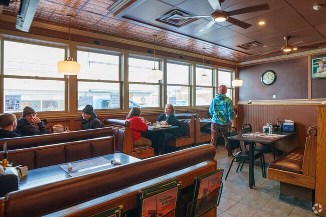 Grab a booth with your friends at the Dutch Village Restaurant and enjoy delicious food and drink in Clymer.