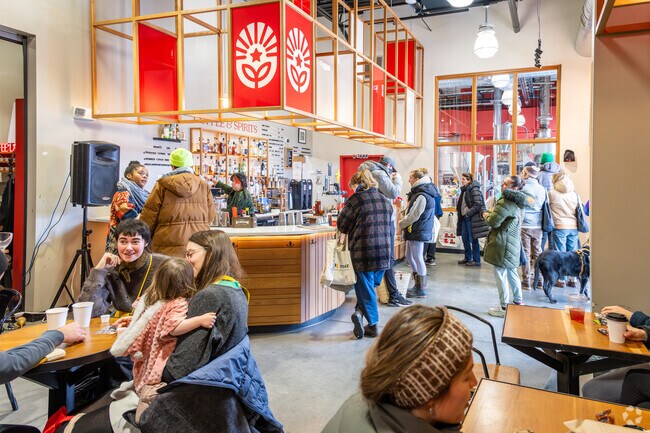 Indulge in a hot cup of coffee at New Harvest Coffee Roasters in Providence's Farm Fresh Market.