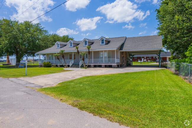 Galliano has a selection of large homes that provide ample driveway space with some form of a porch or patio.