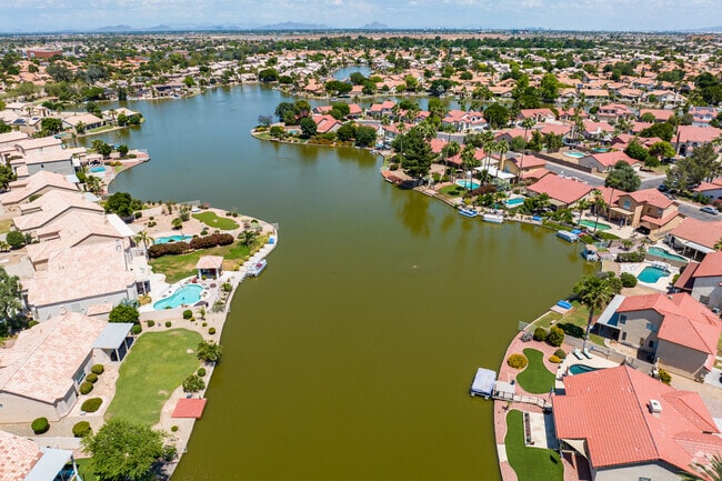 Captivating bird's-eye view reveals the beauty of the lake in Garden Lakes.