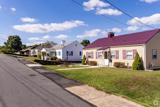 The homes in the Westwood neighborhood are well maintained and have well-manicured lawns.