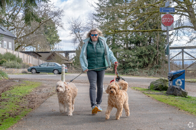 Take your dogs for a walk on the Downtown Riverfront Trail near Fobes Hill.