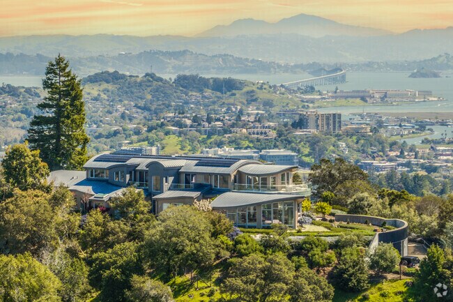 This home in Kentfield can be seen situated atop the mountain with bay views in the distance.