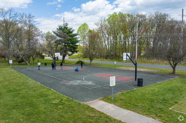Start a pickup basketball game on the courts at Berlin Park.