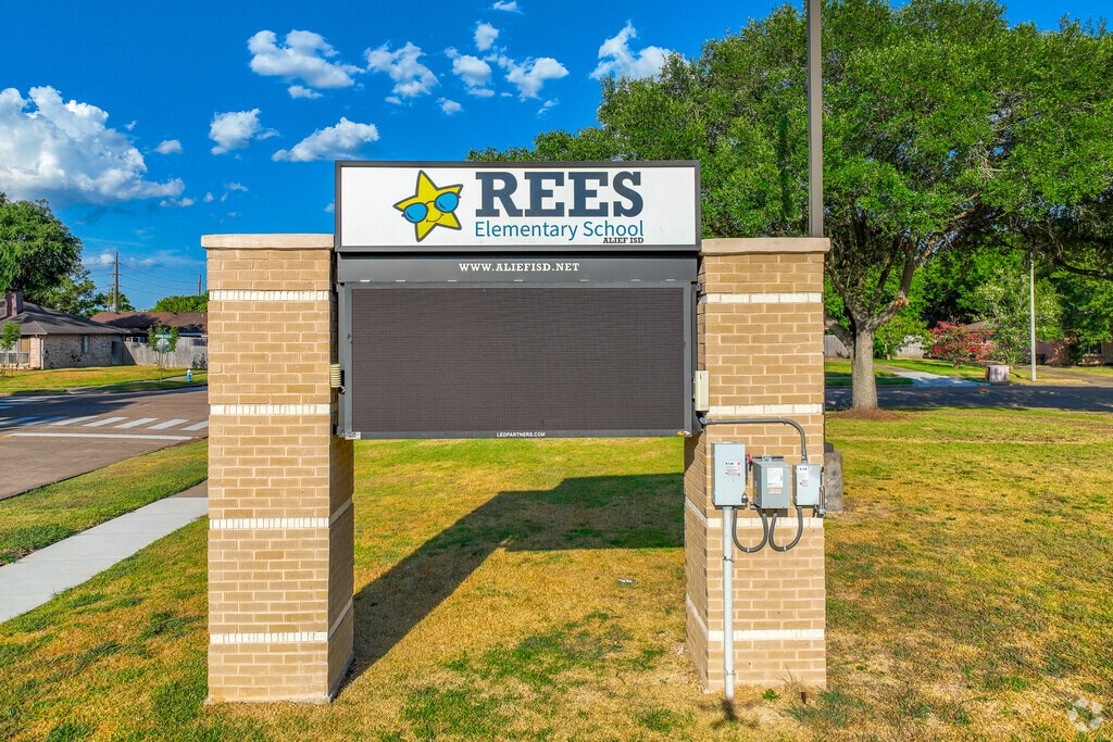 Rees Elementary School signage in Briar Village, TX.