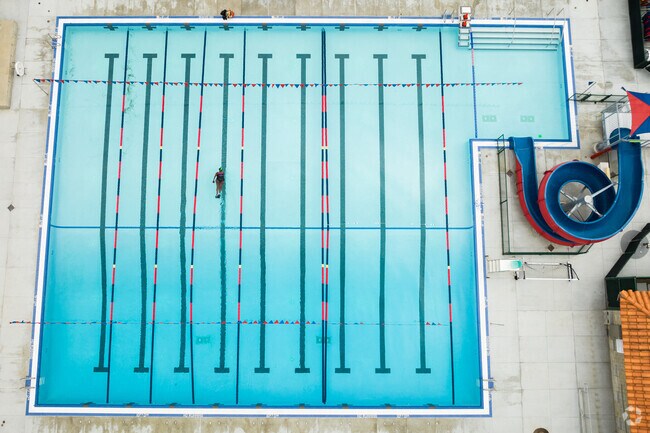 A community pool in City Heights Urban Village helps residents cool off on hot summer days.