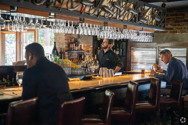 Residents in Paces can grab a seat at the bar at Canoe, serving farm-to-table American cuisine.