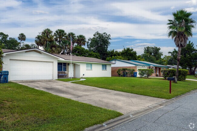 The American Flag proudly flies in front of this row of ranch-style homes in neighborhood K.