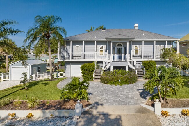 Raised two-story homes are prevalent in the Arbel neighborhood.