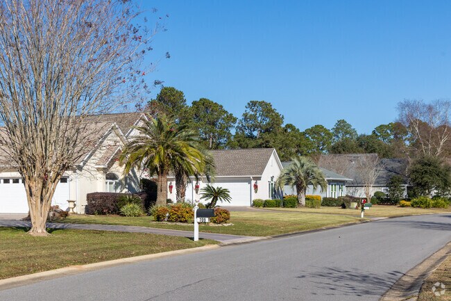 Wide porches and tropical landscaping define Gulf Shores living.