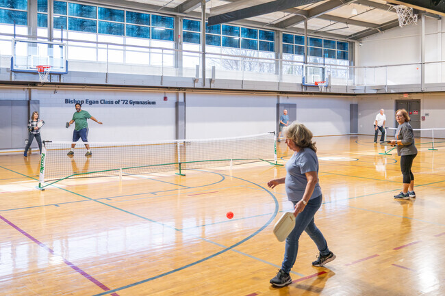 Drexelwood neighbors compete at indoor pickleball at the Fairless Hills YMCA.