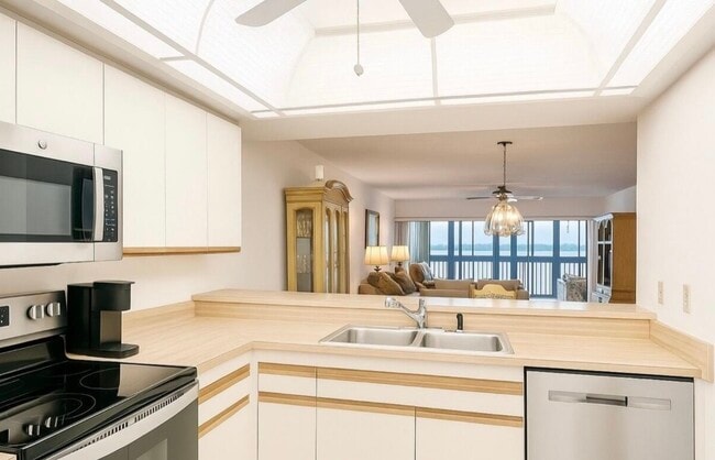 Kitchen open to dining and living room