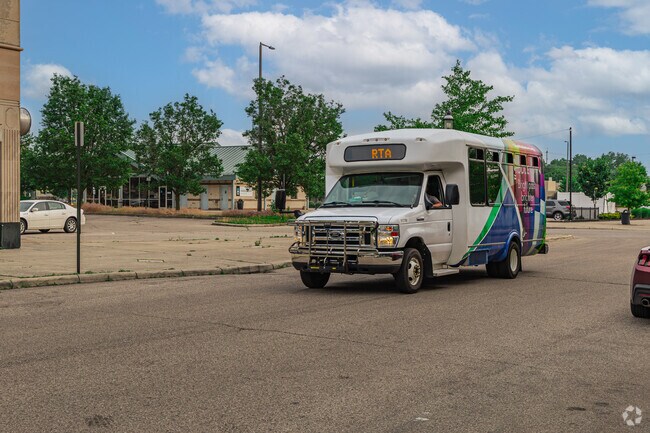 Bus stops for the regional transit authority are located on main adjacent roads and take residents downtown.