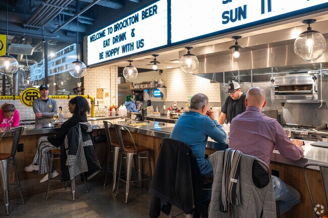 Campello residents enjoy a local brew at Brockton Beer Company.