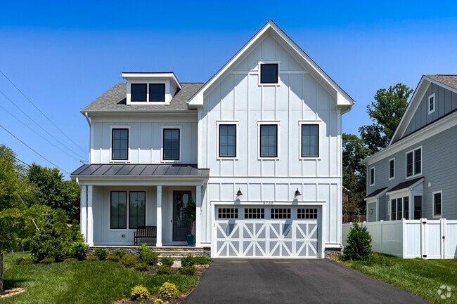 Beautiful landscaping and manicured lawns surround the elegant homes of Merrifield.