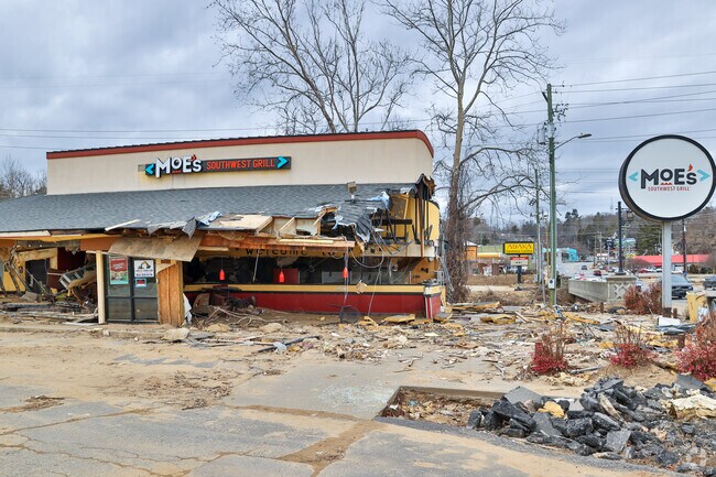 Some areas like Biltmore Park in Asheville are still just as damaged and face an uphill struggle.