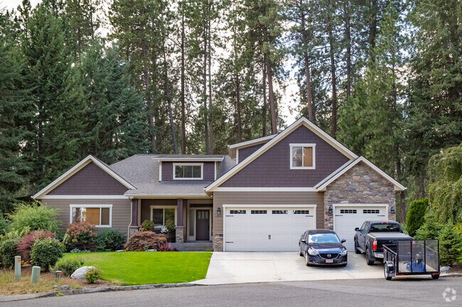 Iconic homes with stone facades tucked into wooded neighborhoods are great for families.
