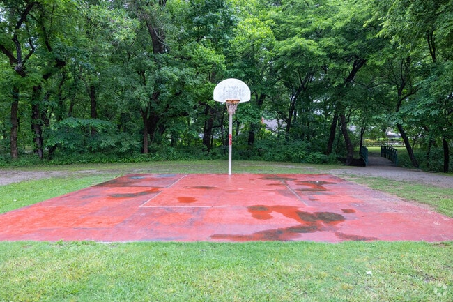 Shoot hoops at the basketball court in Wolf Creek Park.