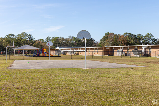 Escatawpa Upper Elementary School has basketball courts and playgrounds for students.
