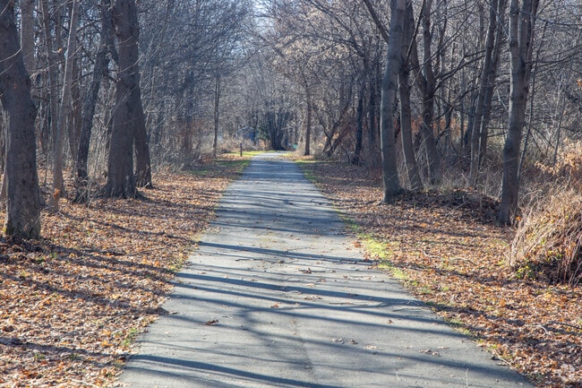A path meanders through South Portland along the Greenbelt Walkway.