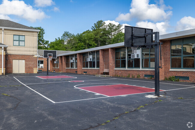 Basketball is one of many sports to play during recess at Louis A. Conley School in Whitman.