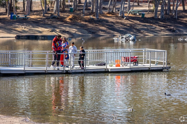 Chollas Lake Pier with people enjoying the view and fishing.
