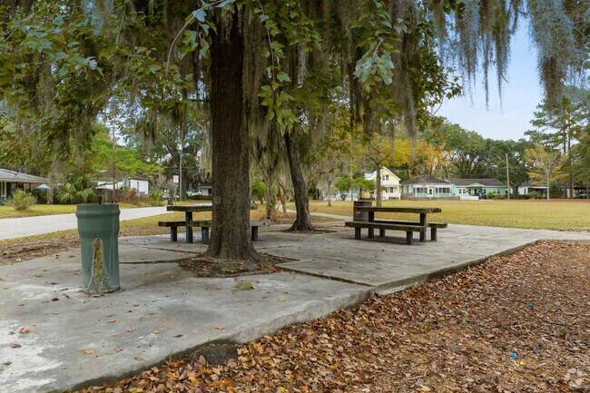 Sit under the trees at the picnic tables at Hitch Park.