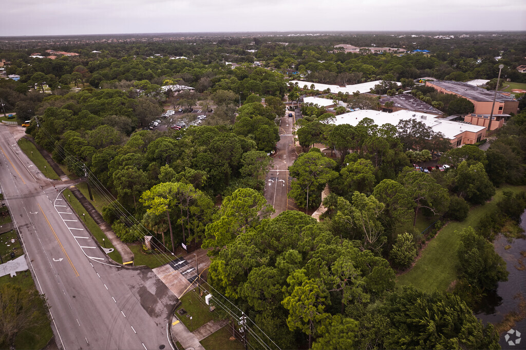 Limestone Creek Elementary School is surrounded by trees and greenery in FL.