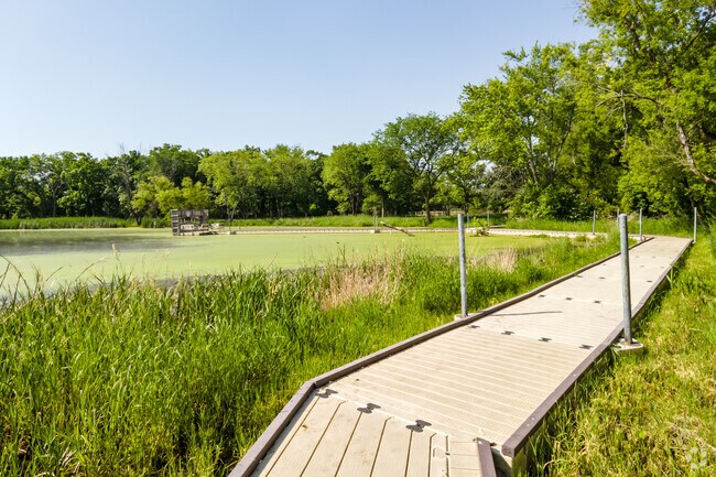 A walkway leading through wetlands in Lincoln Marsh Natural Area located in Jewell Road.