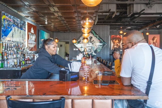 You can grab a seat a the bar for shot and cocktails by Bankhead native rapper, T.I.
