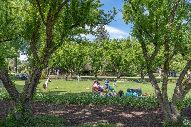 Families will enjoy the green spaces and shade trees in Lilacia Park.