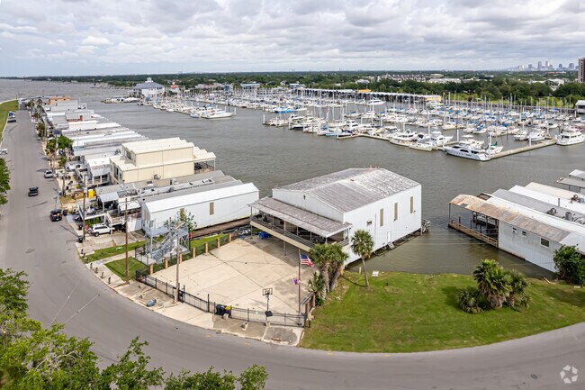 Boathouses border the New Orleans Municipal Yacht Harbor in the West End community.