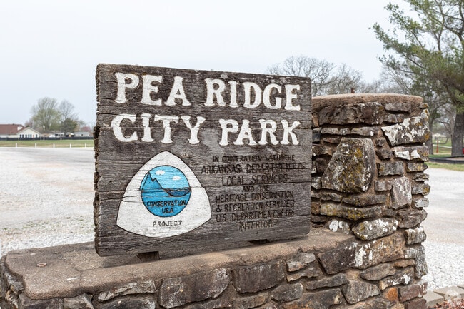 Pea Ridge City Park features playgrounds, courts, and walking trails.